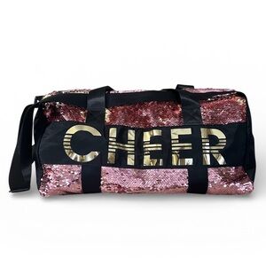 Justice girls duffle bag. CHEER.
Pink to gold sequence flip